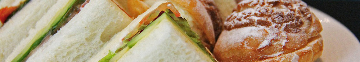 Eating Sandwich at T & D Sandwich restaurant in Fremont, CA.
